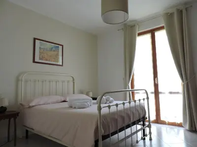 Letto o letti in una camera di Casa Vacanze La Cicala