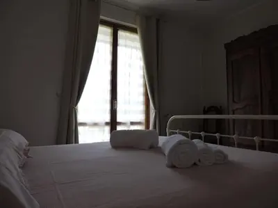 Letto o letti in una camera di Casa Vacanze La Cicala