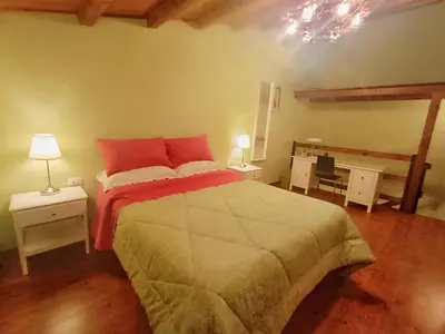 Letto o letti in una camera di CasafioRita
