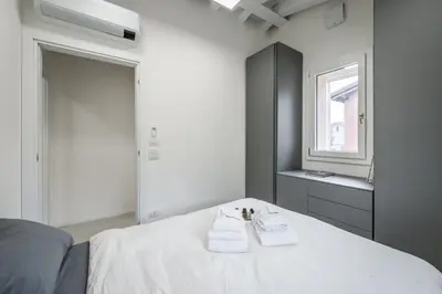 Letto o letti in una camera di Loft Design Free Parking - Maranello - Sassuolo