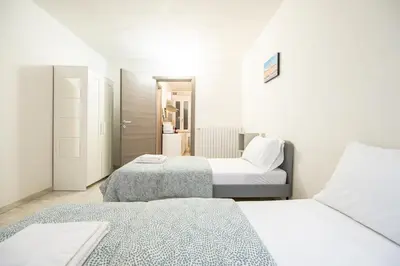 Letto o letti in una camera di Residenze Amelia