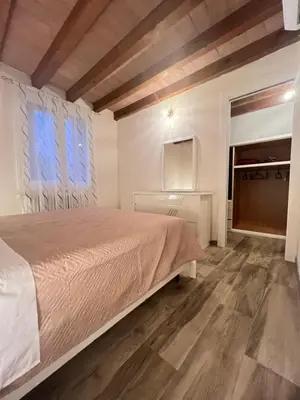 Letto o letti in una camera di BB Parco del Mincio