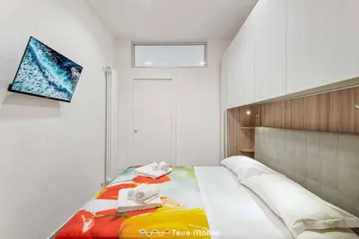Letto o letti in una camera di XX di Mare, Terre Marine