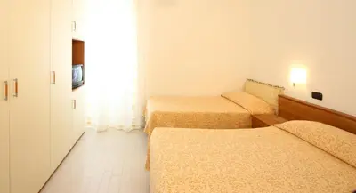 Letto o letti in una camera di Appartamenti In Piazzetta