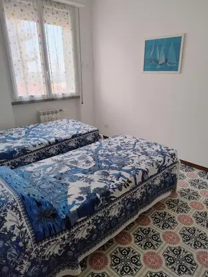 Letto o letti in una camera di Casa Erica