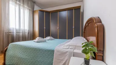 Letto o letti in una camera di Grand Central - Affitti Brevi Italia
