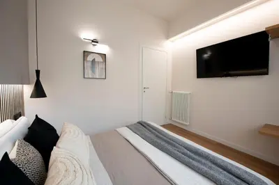 TV o dispositivi per l'intrattenimento presso 224 - Ma & Ma Luxury Apartment, 500metri da mare e spiaggia, vicino alla Baia del Silenzio - PARCHEGGIO GRATIS PRIVATO INCLUSO