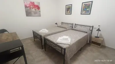 Letto o letti in una camera di VILLA VIOLA B & B