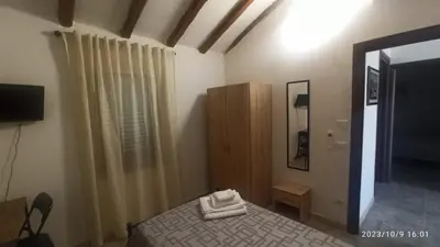 Letto o letti in una camera di VILLA VIOLA B & B