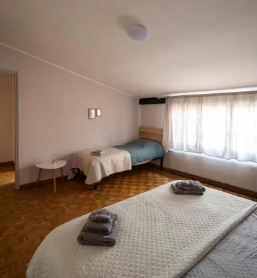 Letto o letti in una camera di Via Verdi LOFT
