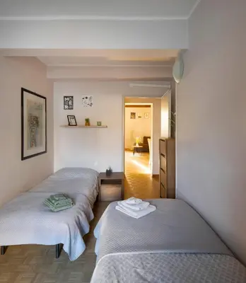 Letto o letti in una camera di Via Verdi LOFT