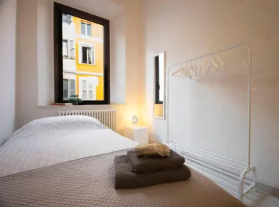 Letto o letti in una camera di Via Verdi SUITE