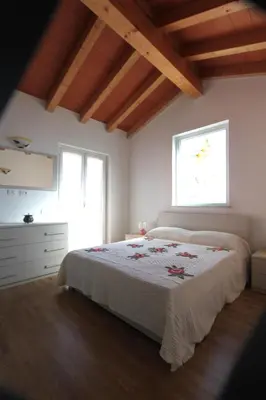 Letto o letti in una camera di Casa vacanze La Fonda