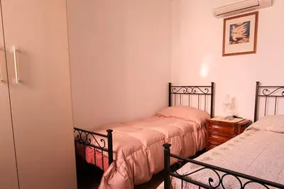 Letto o letti in una camera di Casa vacanze La Fonda