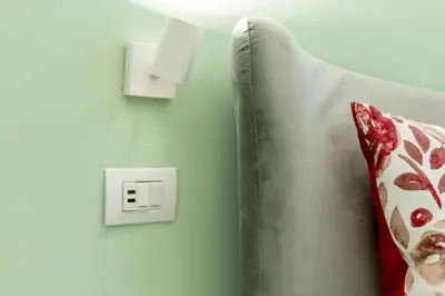 Letto o letti in una camera di GLAM PARMA