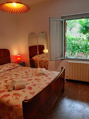 Letto o letti in una camera di Centrale nel verde int 2