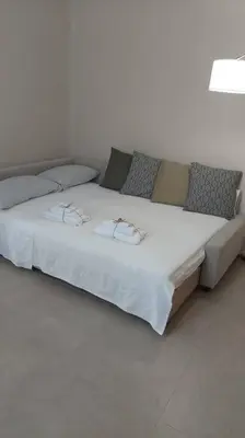 Letto o letti in una camera di Home 11