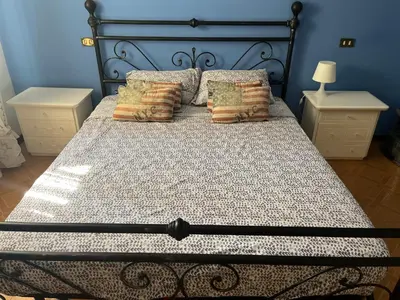 Letto o letti in una camera di Casa Rossa