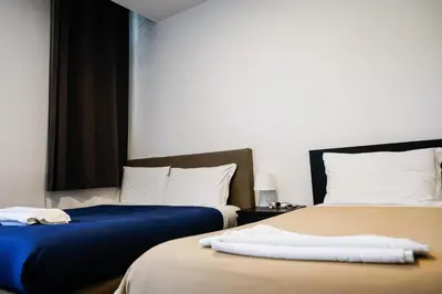 Letto o letti in una camera di Residence del Centro