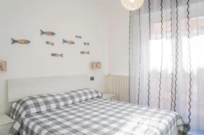Letto o letti in una camera di 020 - Casa Levante - CENTRO città, Carruggio e Mare BAIA DEL SILENZIO a 500 m