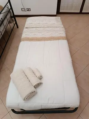 Letto o letti in una camera di AleGio Home