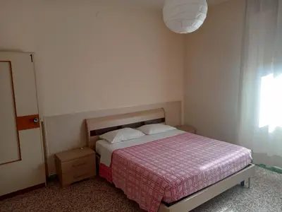 Letto o letti in una camera di Casa Mawi