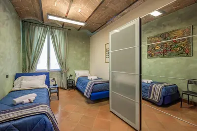 Letto o letti in una camera di Modena Palace Suite [Duomo - 5 Stelle]