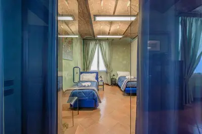 Letto o letti in una camera di Modena Palace Suite [Duomo - 5 Stelle]