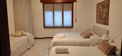 Letto o letti in una camera di Villa Gaudi