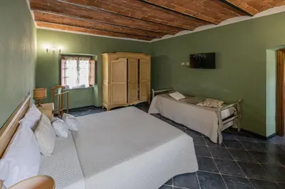 Letto o letti in una camera di Hotel Ristorante la Luna