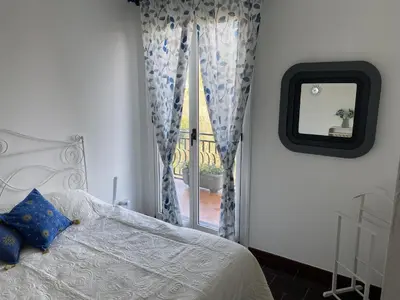Letto o letti in una camera di Casa Panorama