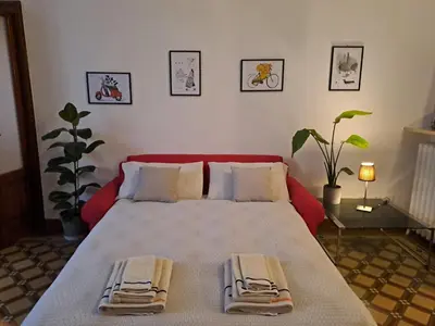 Letto o letti in una camera di B&B Alice