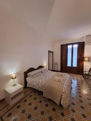 Letto o letti in una camera di B&B Alice