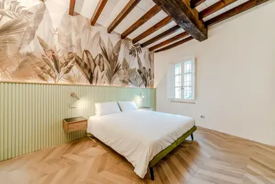 Letto o letti in una camera di Parco Ducale Design Rooms