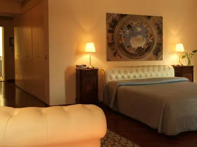 Letto o letti in una camera di Casa Margherita