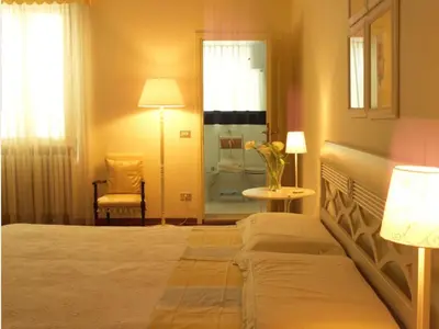 Letto o letti in una camera di Casa Margherita