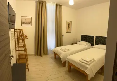 Letto o letti in una camera di LOMA Apartment