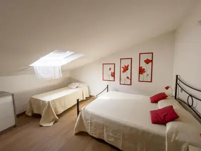 Letto o letti in una camera di Palazzo del Duca