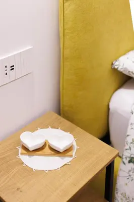 Letto o letti in una camera di Feltrinelli Suite