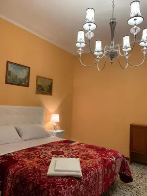 Letto o letti in una camera di PRINCIPE ROOMS