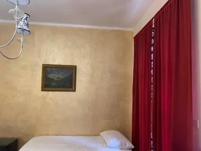 Letto o letti in una camera di PRINCIPE ROOMS