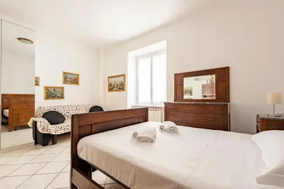Letto o letti in una camera di JOIVY Cosy flat with parking in Chiavari