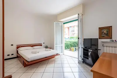 Letto o letti in una camera di JOIVY Cosy flat with parking in Chiavari