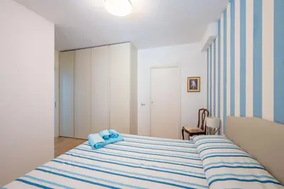 Letto o letti in una camera di SeaView Cavi B. [100mt dal Mare]
