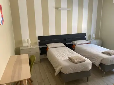 Letto o letti in una camera di Lisonino House
