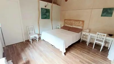 Letto o letti in una camera di Caterina e l'Indaco
