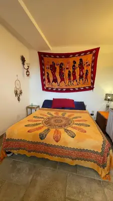 Letto o letti in una camera di Magico Appartamento e Tramonti in Terrazza Vista Mare in Liguria, 6 posti letto