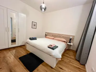 Letto o letti in una camera di GuestHost - Un Nido a Mantova Historic Apt near the Center!