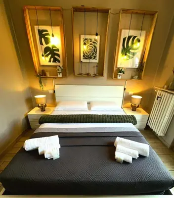 Letto o letti in una camera di APPARTAMENTO CREMONA FIERA