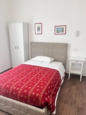 Letto o letti in una camera di ALO ALO ALBERGO